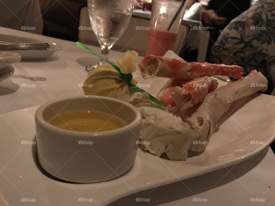 King crab legs at a restaurant. Romantic settings 