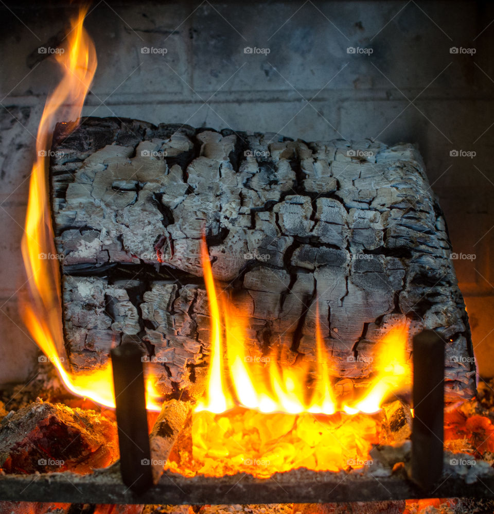 Log on the fire place