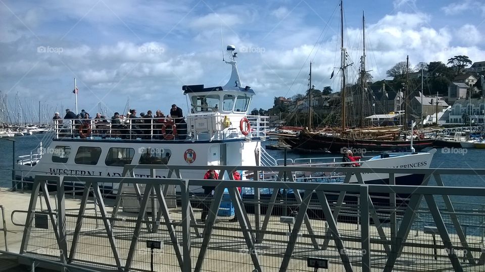 The hugely popular ferry from Brixham to Torquay, docked in Brixham, with plenty of passengers.