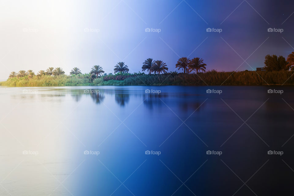 day to night landscape 7 hours balm trees morning dark sunrise egypt nile cairo water blue yellow green red reflect reflection sky clear new ideas landmark spot best seen the only one neutral whether one day long day shoot wildlife