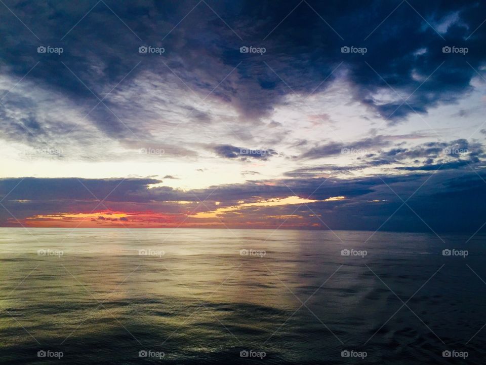 Dark clouds above ocean 