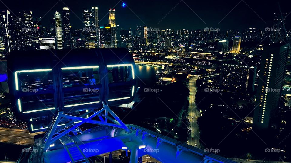 enjoy the beautiful city of singapore from a height at night.