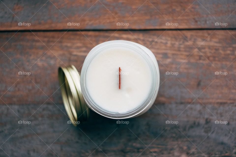 candle on a picnic table
