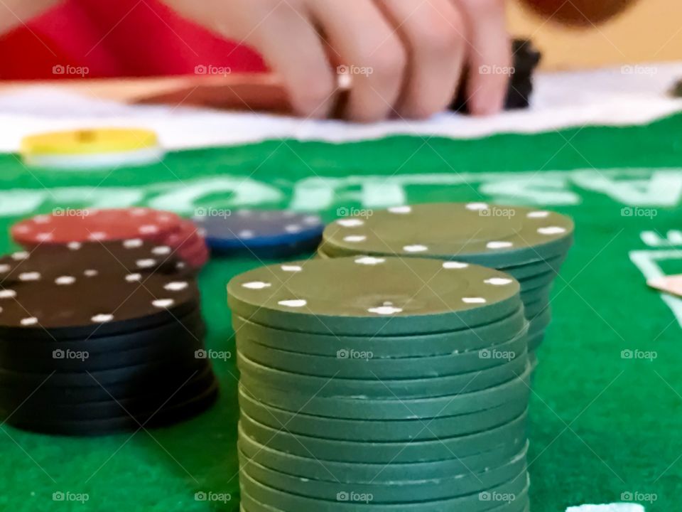 Stack of Poker chips on poker table