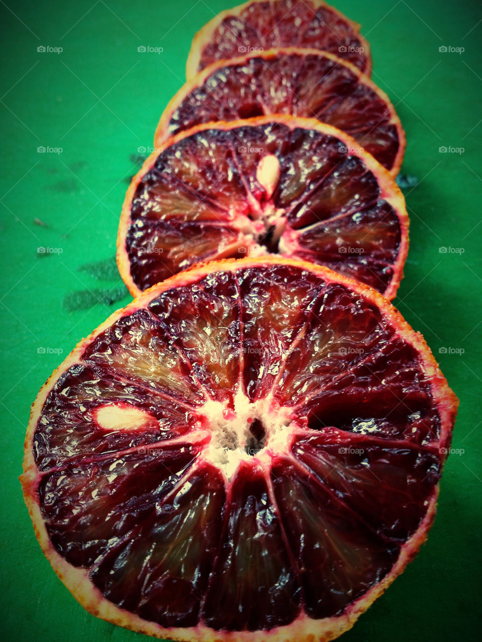 green red orange fruit by lanocheloca