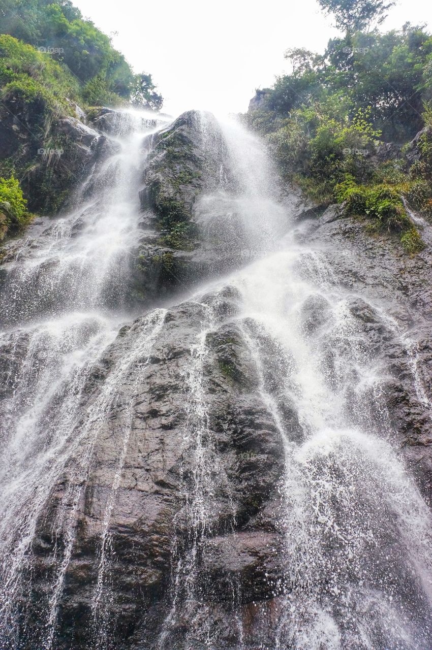Drips and Drops. The watetfalls is situated in one of the National Parks in China.