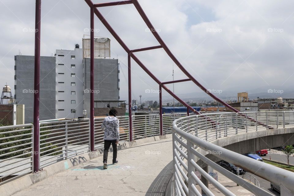 Tourist walkway on concrete bridge.