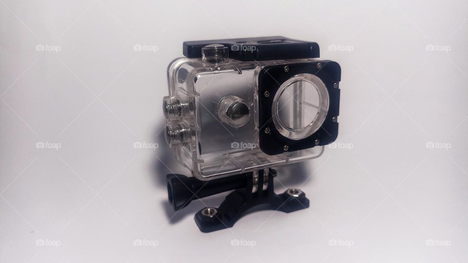 Small waterproof camera holder on isolated white background in eye level view