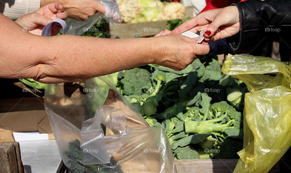 Payment at local market.