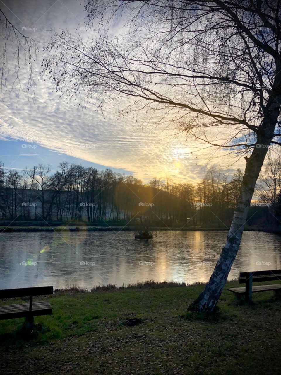 Iced Lake in cloudy sunset
