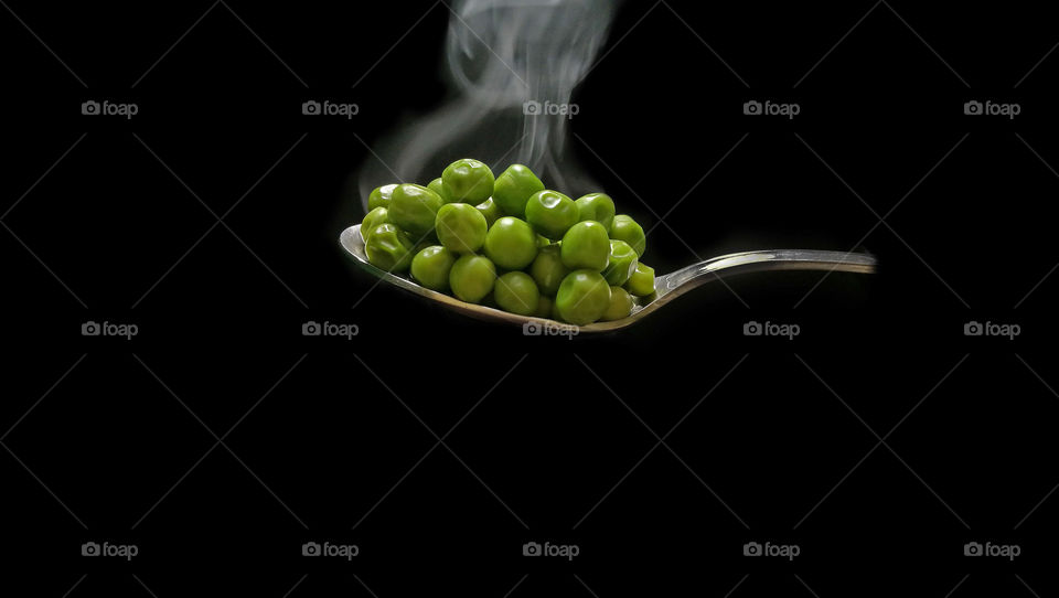 spoon of hot peas.