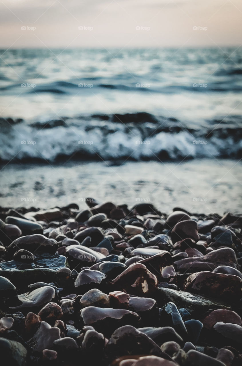 Sitting on the rocky shore of Lake Superior. Relaxing to the gentle sound of waves.