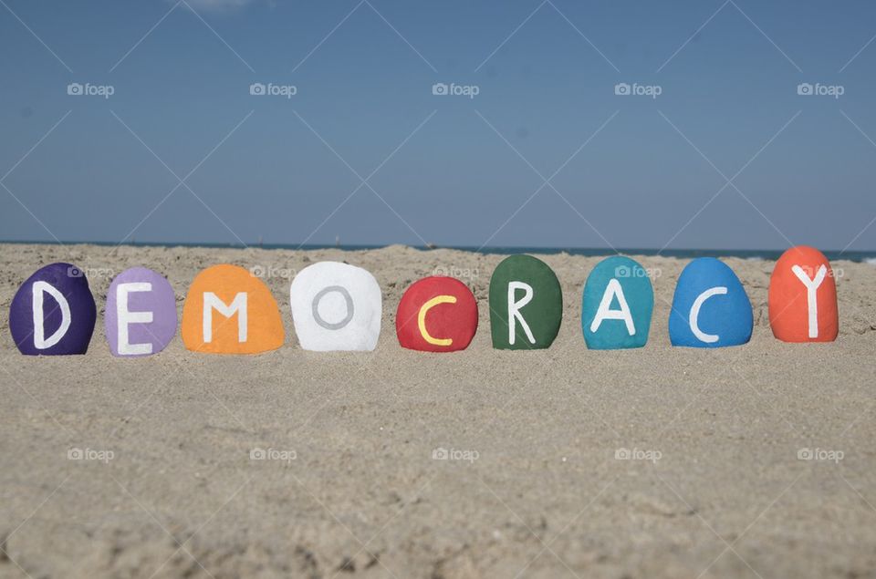 Concept of Democracy with colourful stones