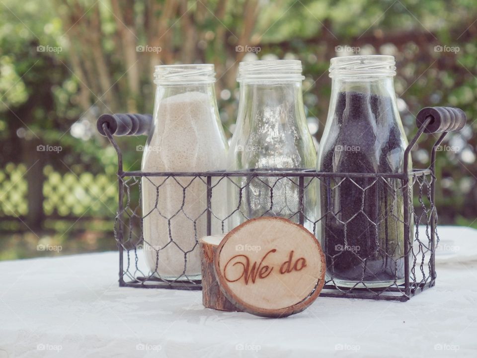 Rustic wooden ring box and sand ceremony.