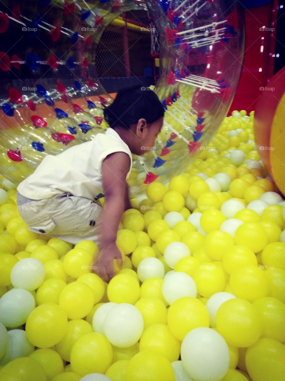 Child enjoy the ball