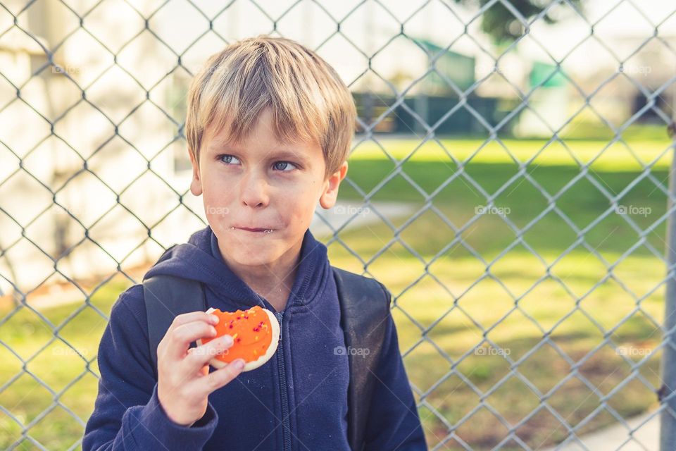 boy eating cookie