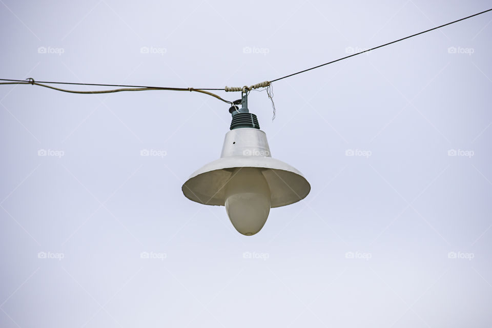 Round light bulbs for illumination at night Background sky