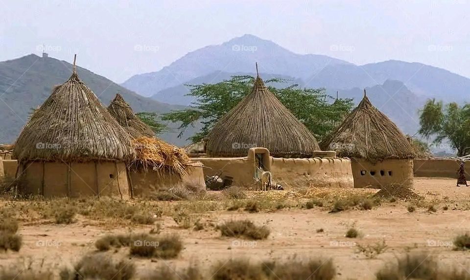 A stunning view of green mountains covered in fog in Yemen