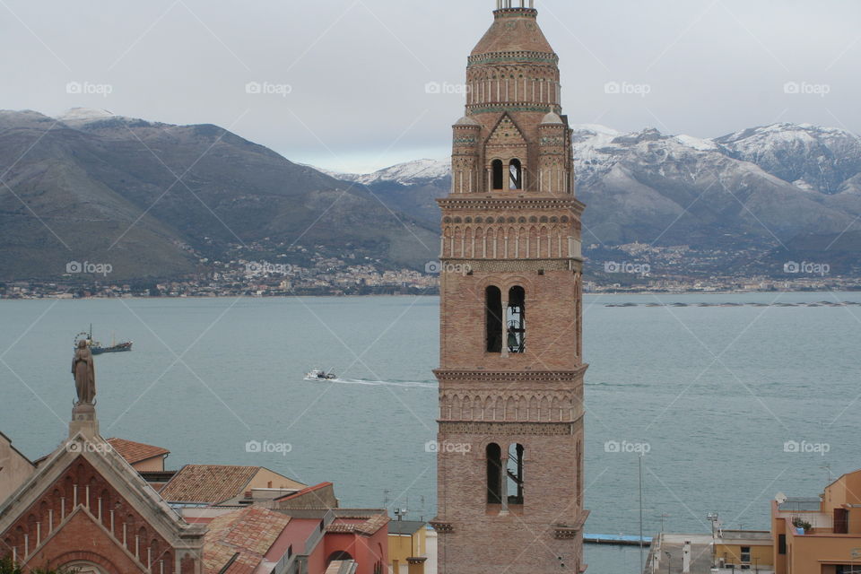 Church with snowy mountains on background