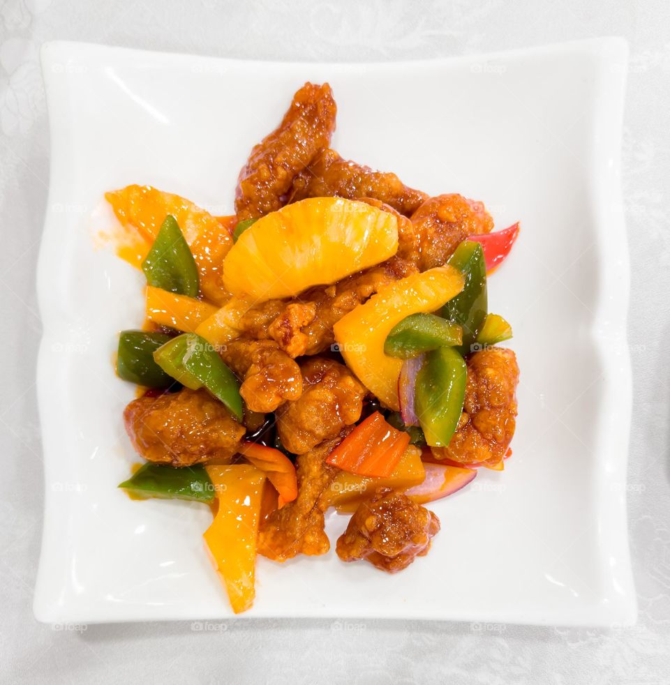 Plate of sweet and sour pork at a Chinese restaurant
