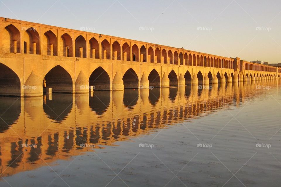 Reflections of Si-o-se-pol bridge in Isfahan, Iran