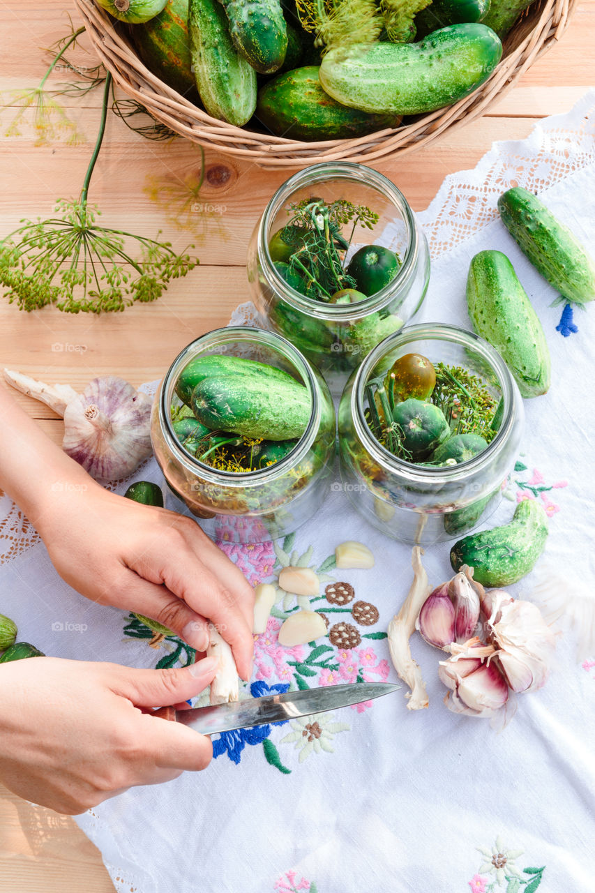 Pickling cucumbers. Pickling cucumbers with home garden vegetables and herbs