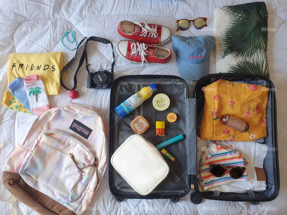 summer suitcase flat lay