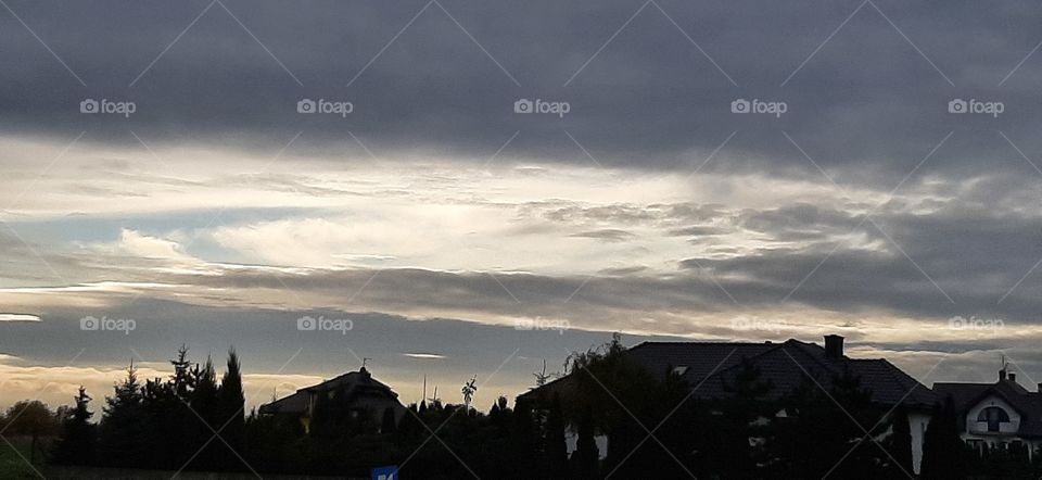 Dark sky with light clauds