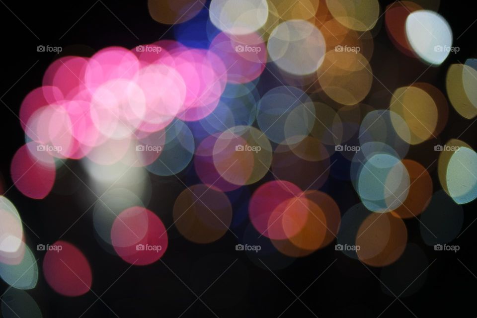 Mingles of lights flash together at the Perth royal show at night time during the fireworks show