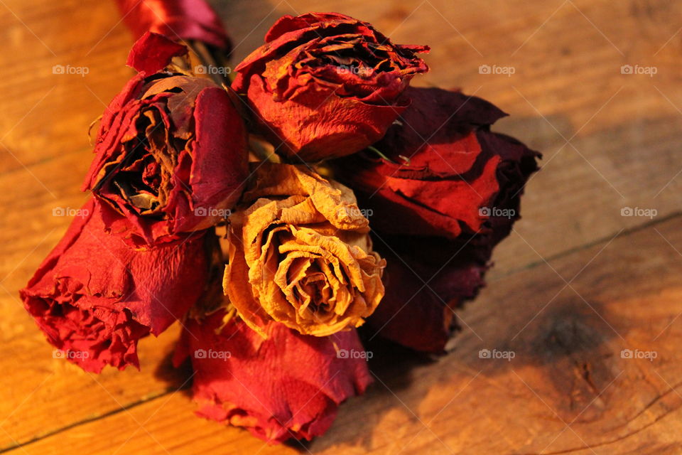 roses on wooden table