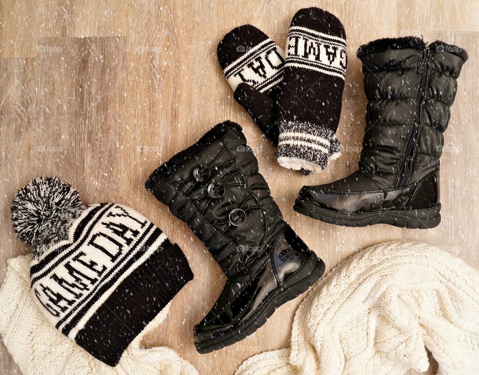 Pair up for the cold for your little one with all the winter must-haves like waterproof snowboots, hats, and mittens!