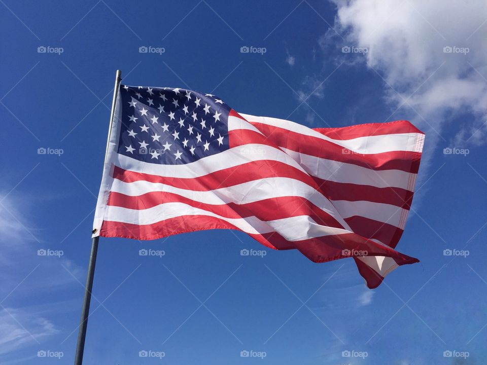 US flag against a blue sky 