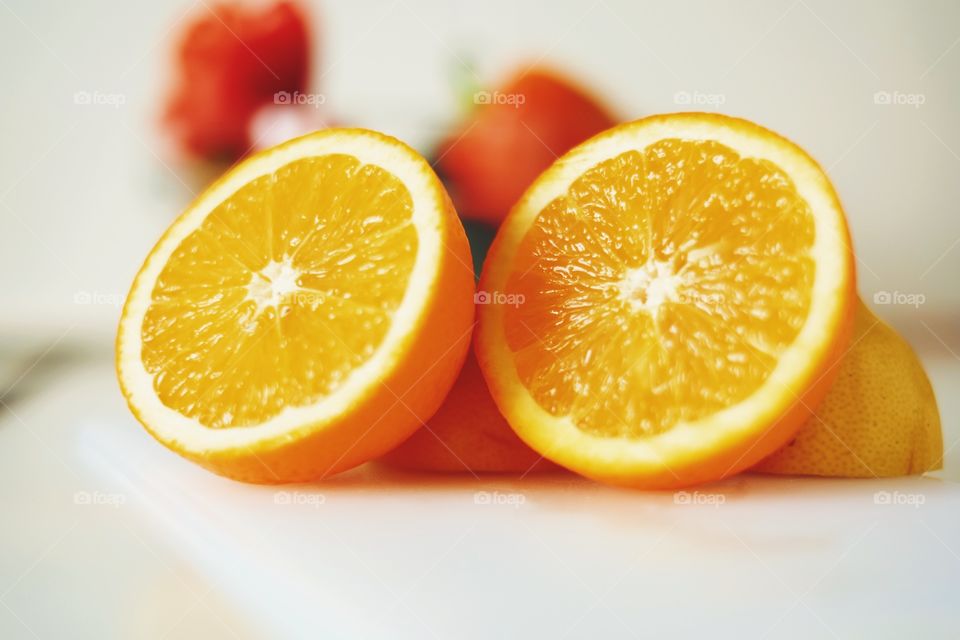 Fresh orange on table. True booster