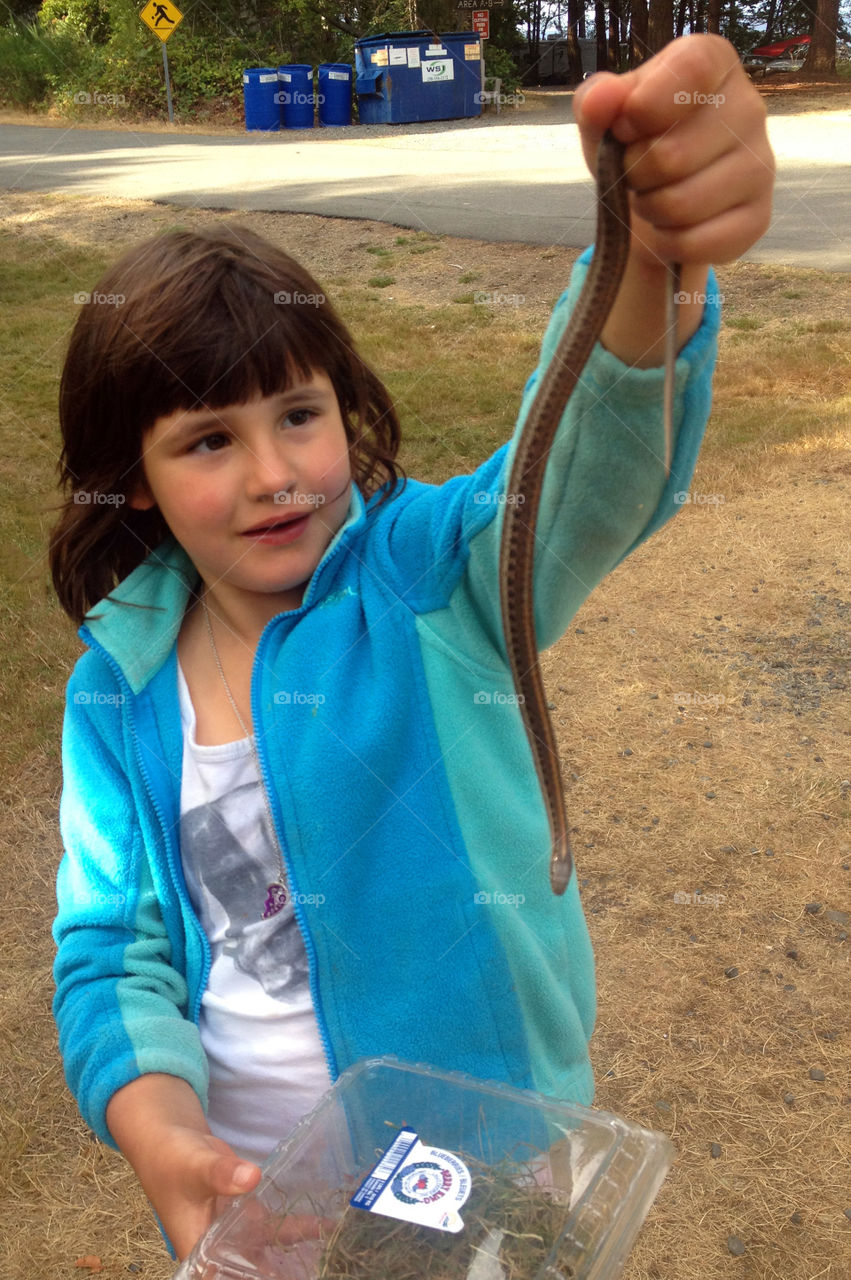 Summertime Is about camping & exploring nature. My fearless girl caught a garter snake & wanted to add him to our zoo! Luckily, we convinced her he would miss his family too much & she let him go! ๐