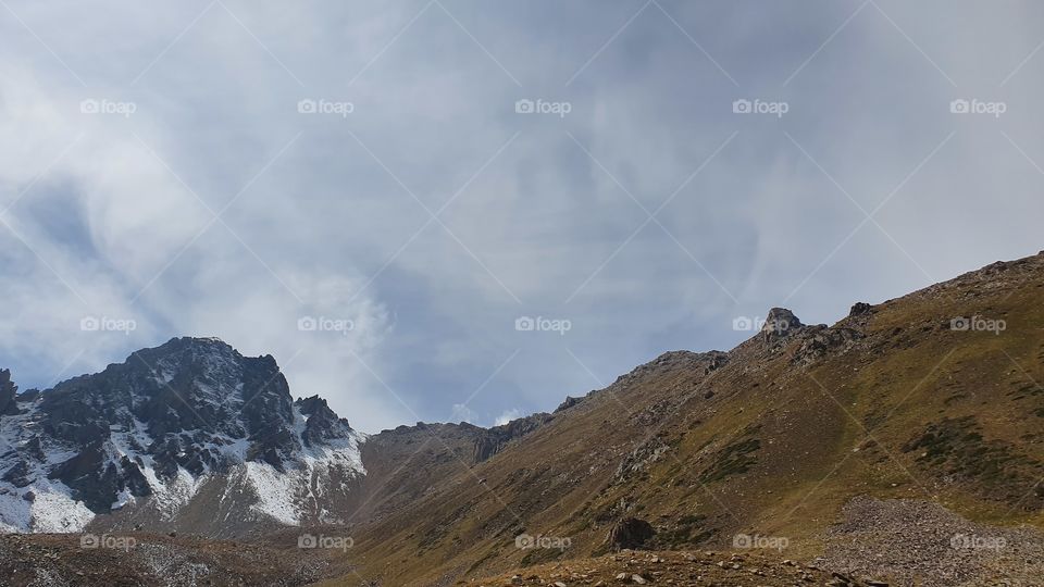 Almaty mountains peaks and cloud