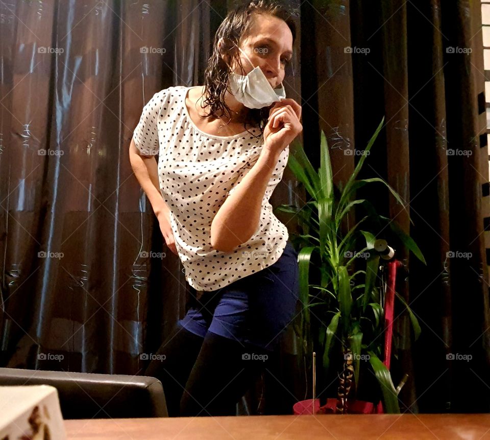 Take a pose withe mouth mask.