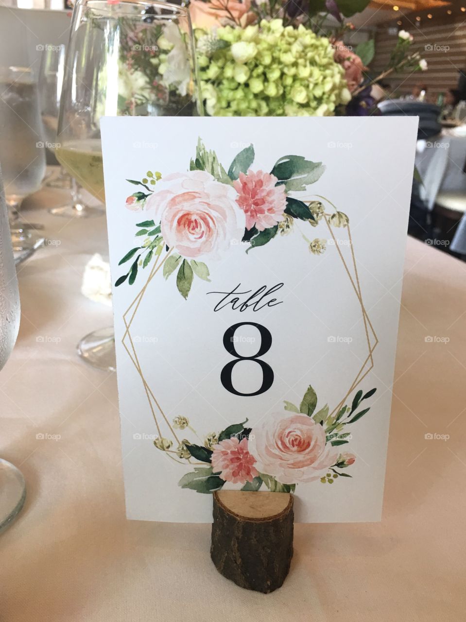 Floral table number card at event