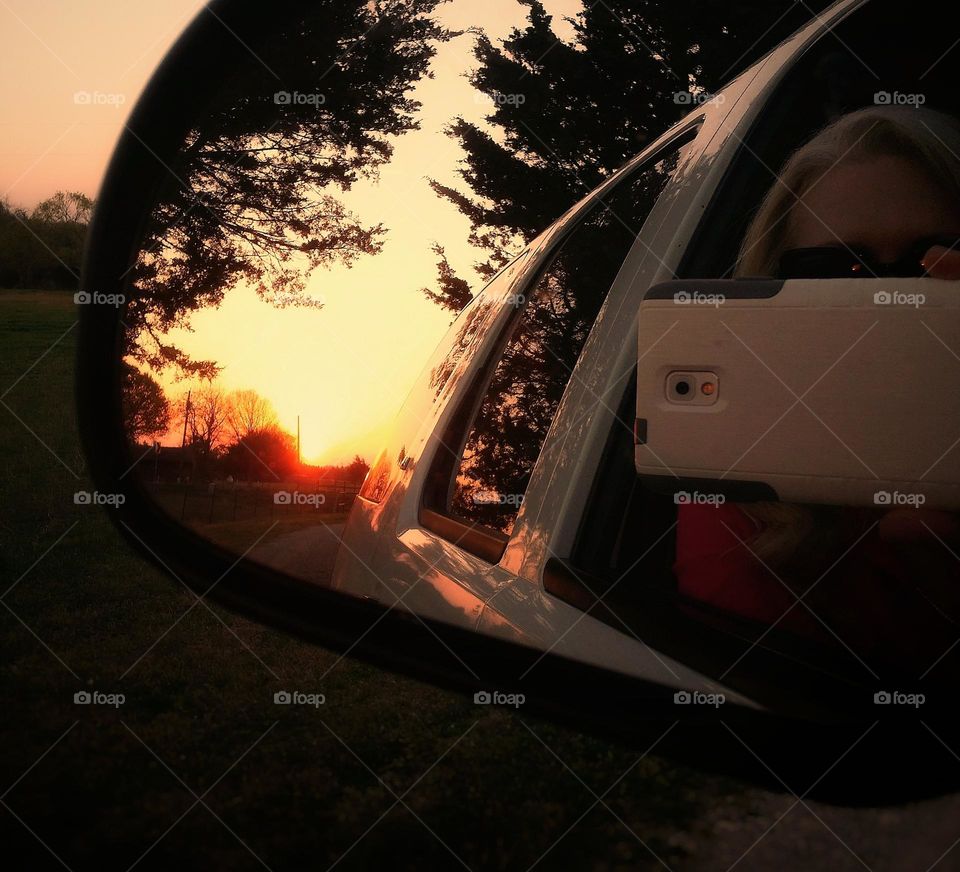 Taking a Sunset Photo in the Car Mirror