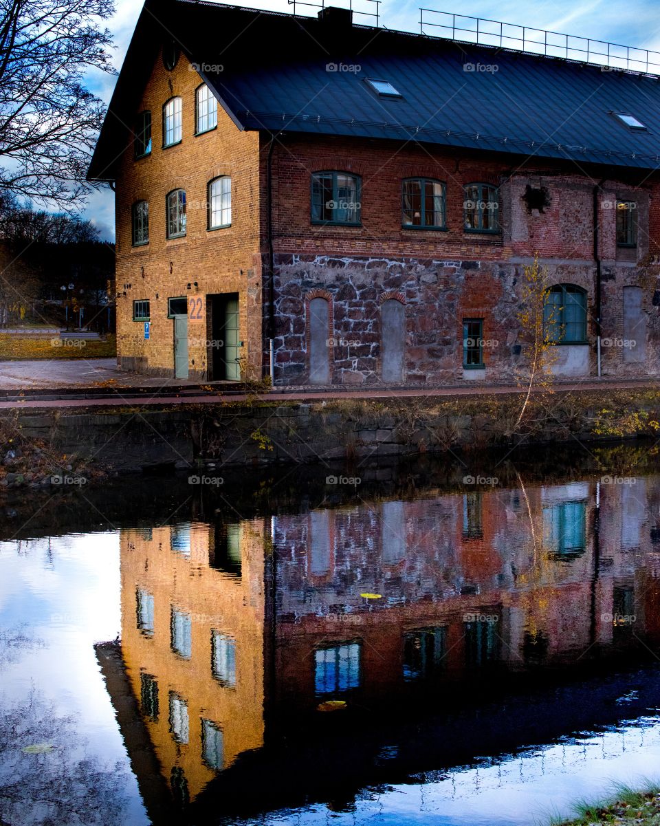 old brick warehouse building along the river in Borås Sweden