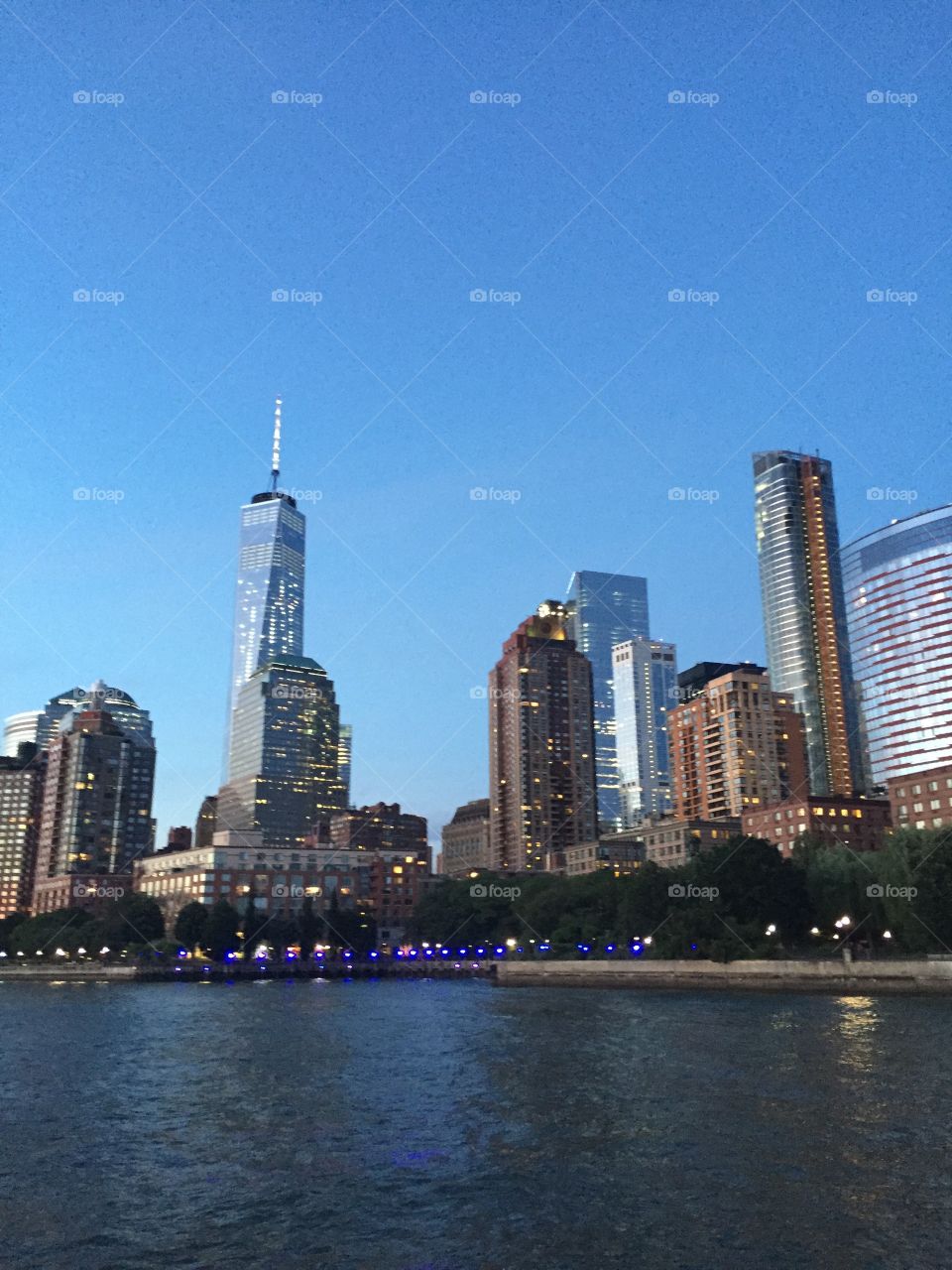 Water view of the downtown NYC skyline including the new Freedom tower