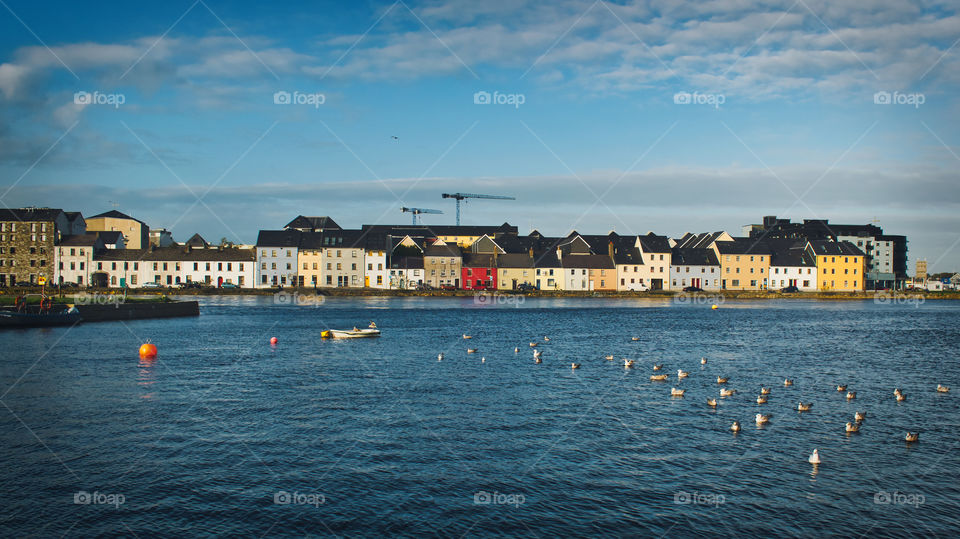 Colorful houses by the Corrib River at Galway City in Ireland