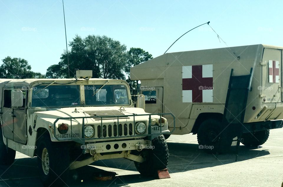 Military vehicles at a point of distribution for relief supplies in southeast Texas after Hurricane Harvey.