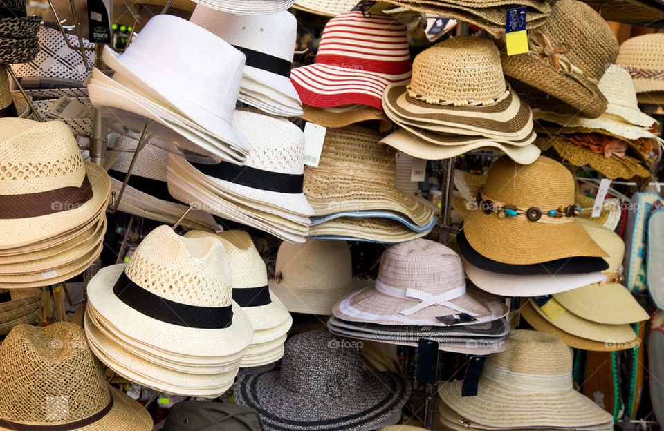 Assorted hats for sale.