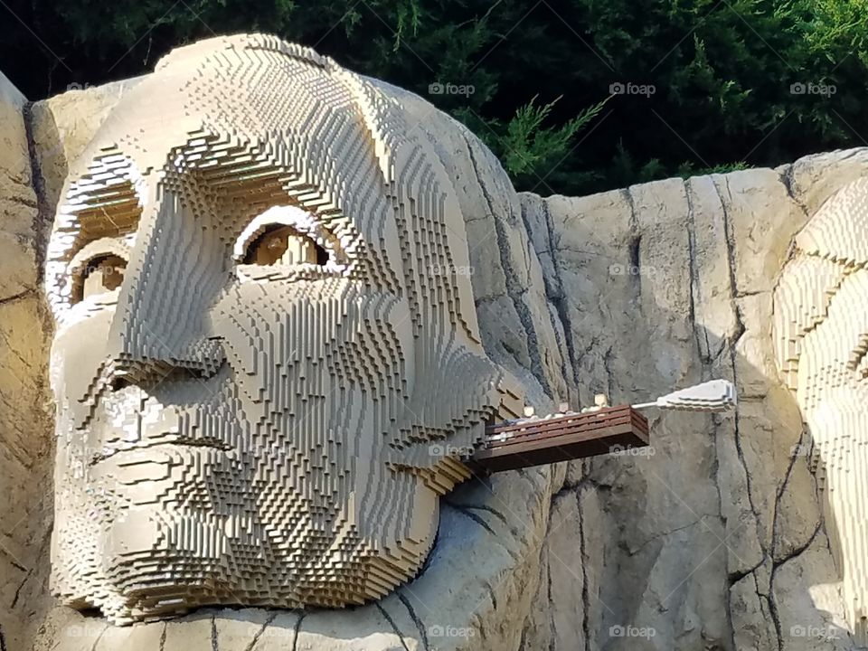 Gigantic Lego Sculpture of US President cleaning his ear
