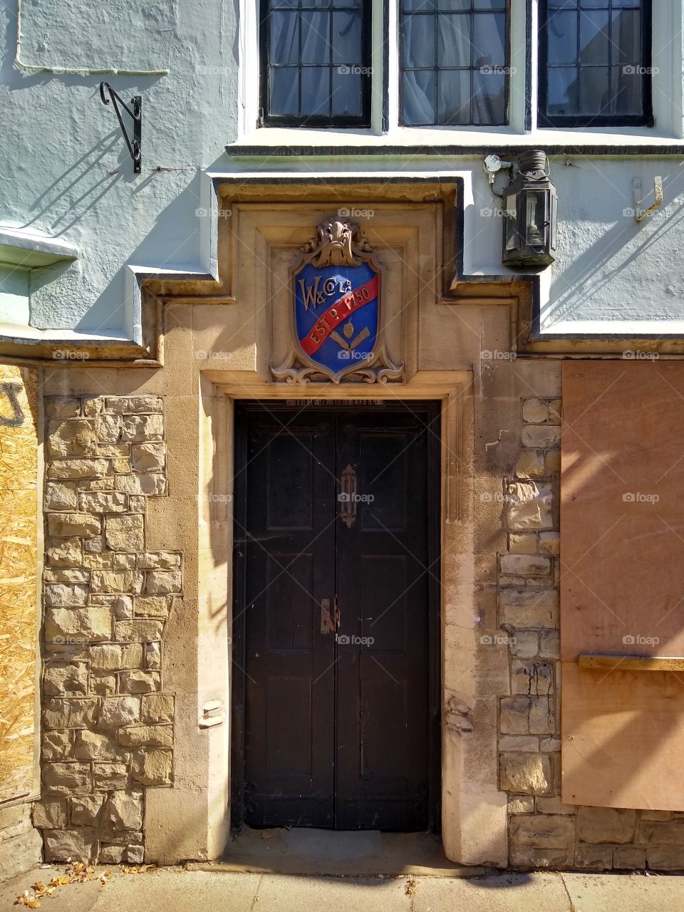 A gate with a coat of arms