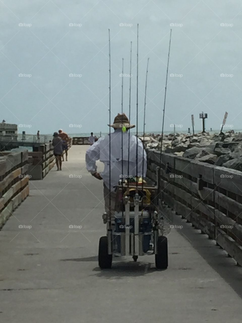 Fisherman on the pier at Jetty Park