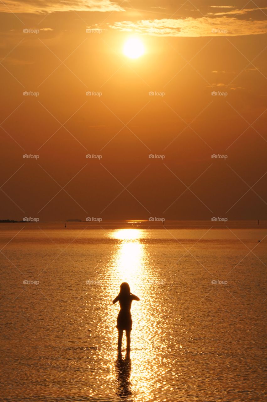 Girl in sunset