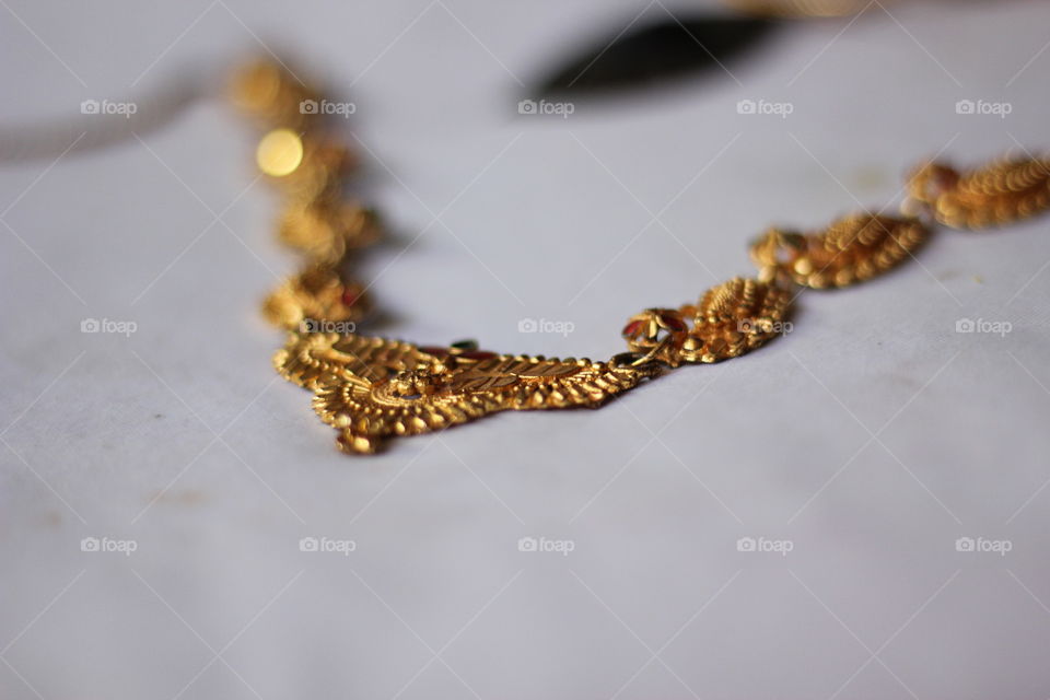 Close-up of gold neckless