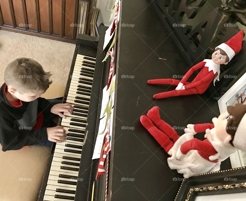 Elves on top of piano