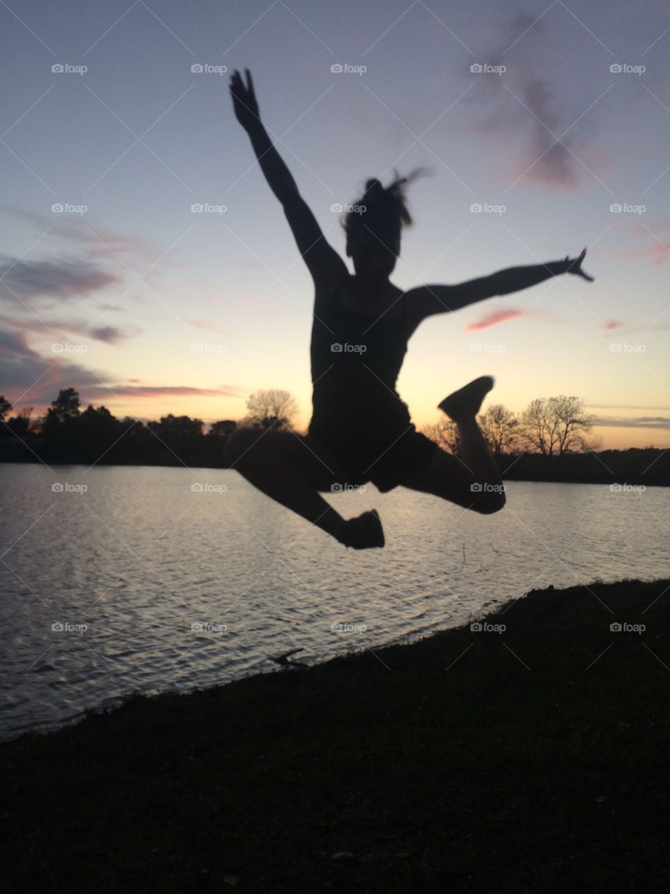 Dancing Silhouette by the Lake